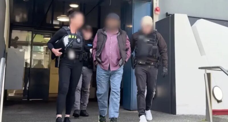 Australian man is accused of being Islamic State group propagandist who shared 10,000 files online