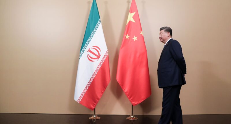 China's Xi keeps Iranian president at arm's length ahead of Trump summit
