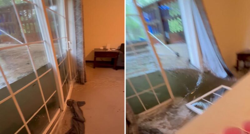 Dramatic video captures floodwaters bursting through glass doors of college students’ home