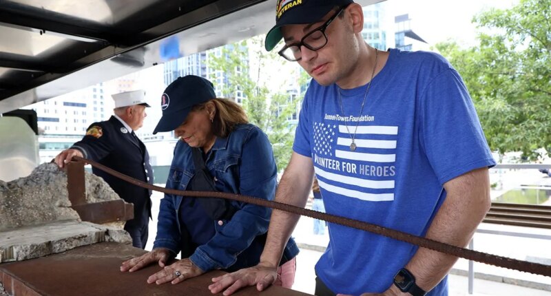 First responders honor World Trade Center beam arriving at Boston fallen heroes memorial