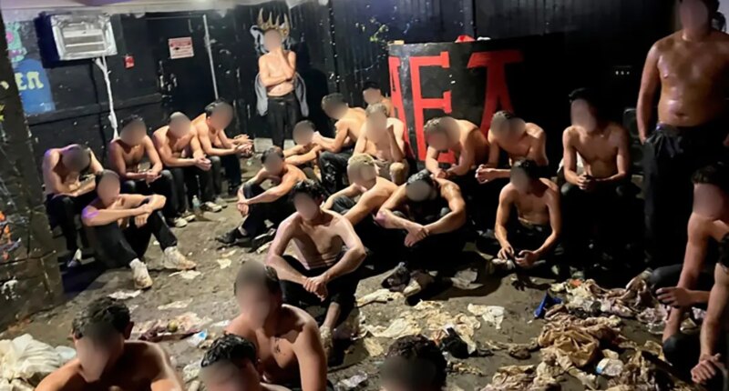 Frat leaders arrested after cops found dozens of nearly-naked teens in dingy basement in suspected hazing incident