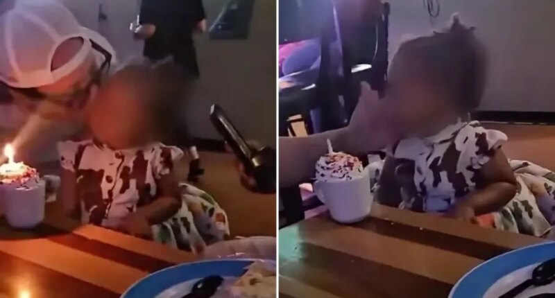 Kansas bar owner kisses toddler girl blows out birthday candle at Stearman Field Bar and Grill