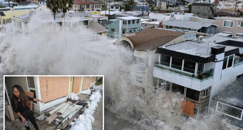 Long Beach homeowners flee as 12-foot waves smash seawall, flood homes and destroy cars