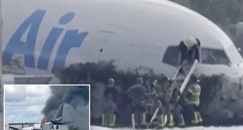 Miami firefighters seen climbing into Amazon cargo jet after shouting on dispatch 'The plane is on fire'