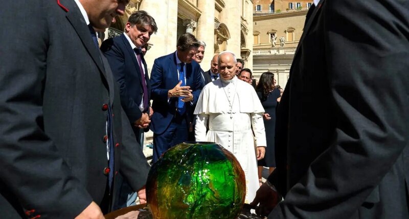 Pope Leo XIV receives 'symbolic’ sphere in charity's push for AI to 'protect human dignity'