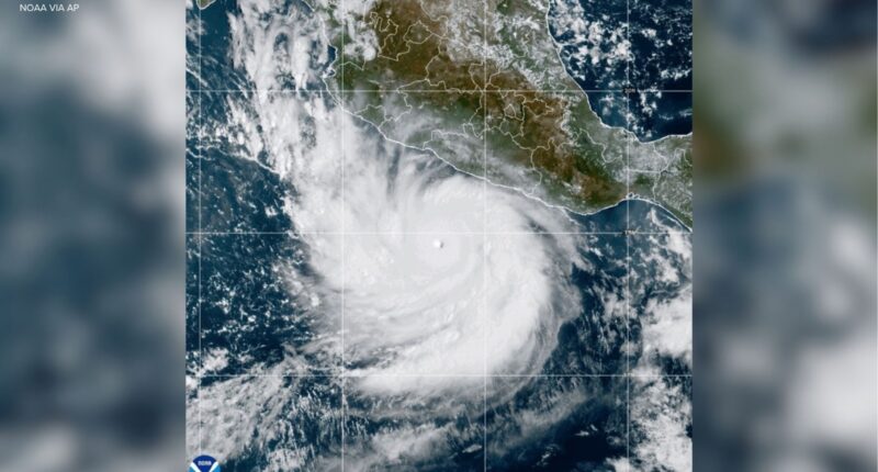 Powerful Hurricane Polo drenches Mexico's coast from offshore as Nolo nears Hawaii