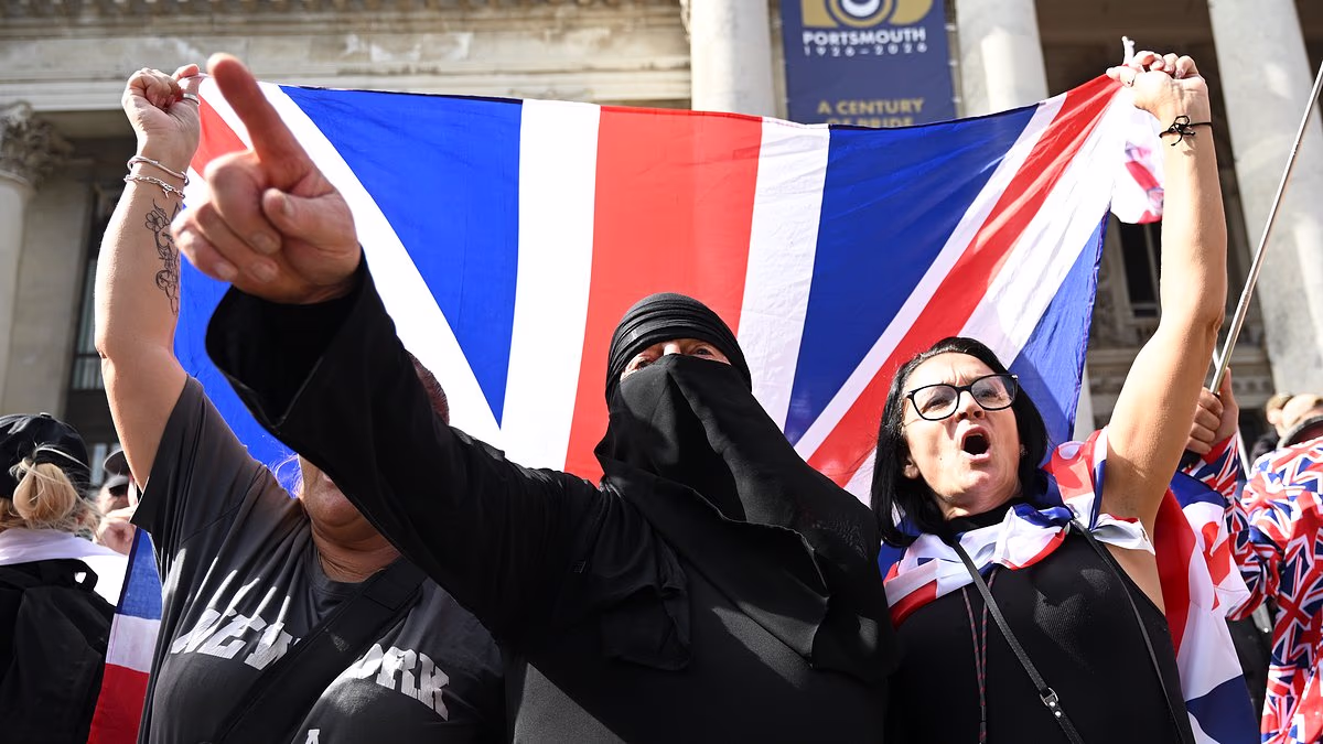 Protester Charged With Concealing Identity at Anti-Immigration Demonstration