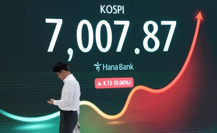 Asian shares are mixed after Wall Street gains, oil price steadies
