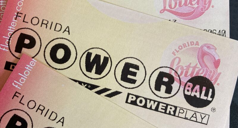 Powerball lottery tickets are shown, Monday, Oct. 31, 2022, in Surfside, Fla..(AP Photo/Wilfredo Lee)