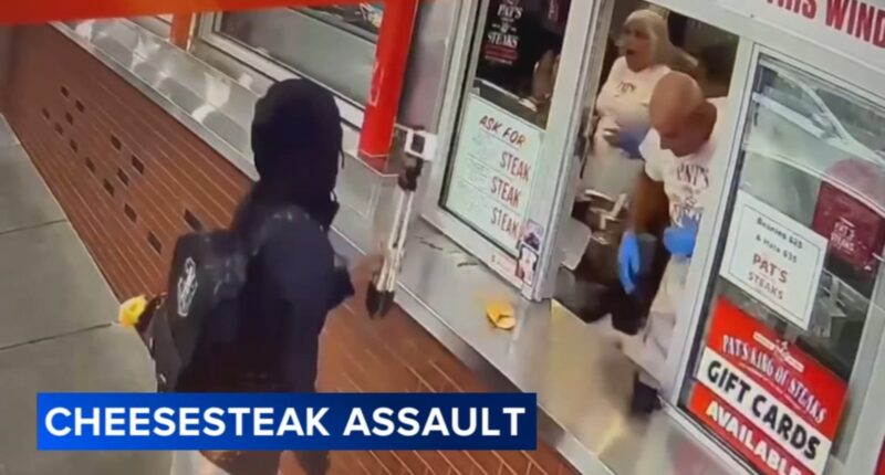 Man at center of Philadelphia cheesesteak assault surrenders, police say