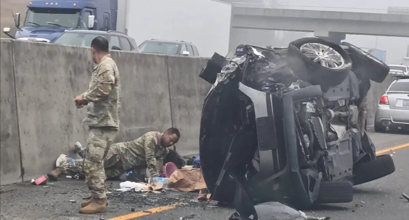 Woman allegedly stabs girl after SUV hits semi as soldiers step in to stop horrific roadside attack